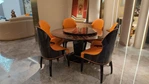 Round Dining Table with High-Gloss Geometric Wood Veneer and Integrated Rotating Tray